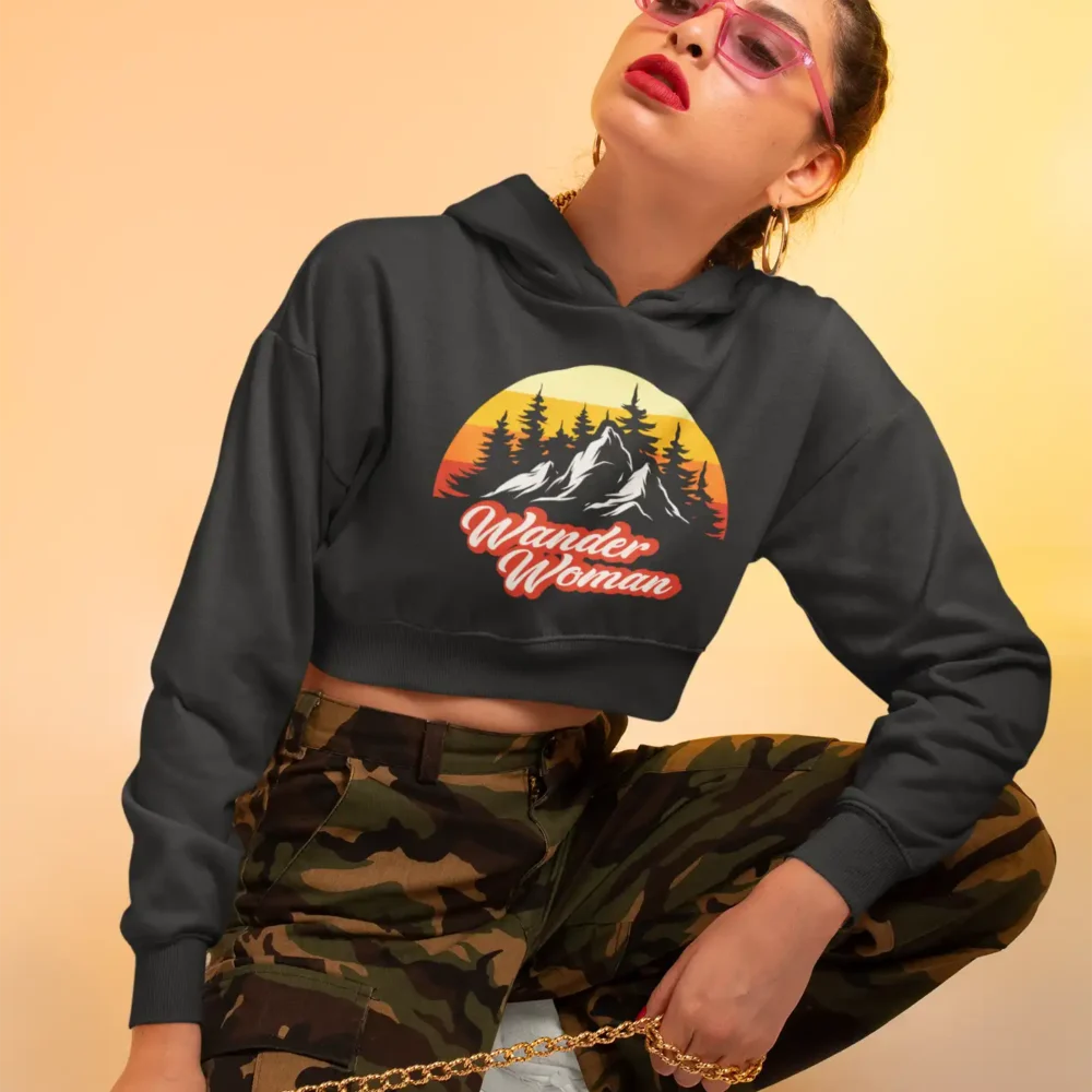 Wander Woman crop hoodie featuring retro sunset over mountains