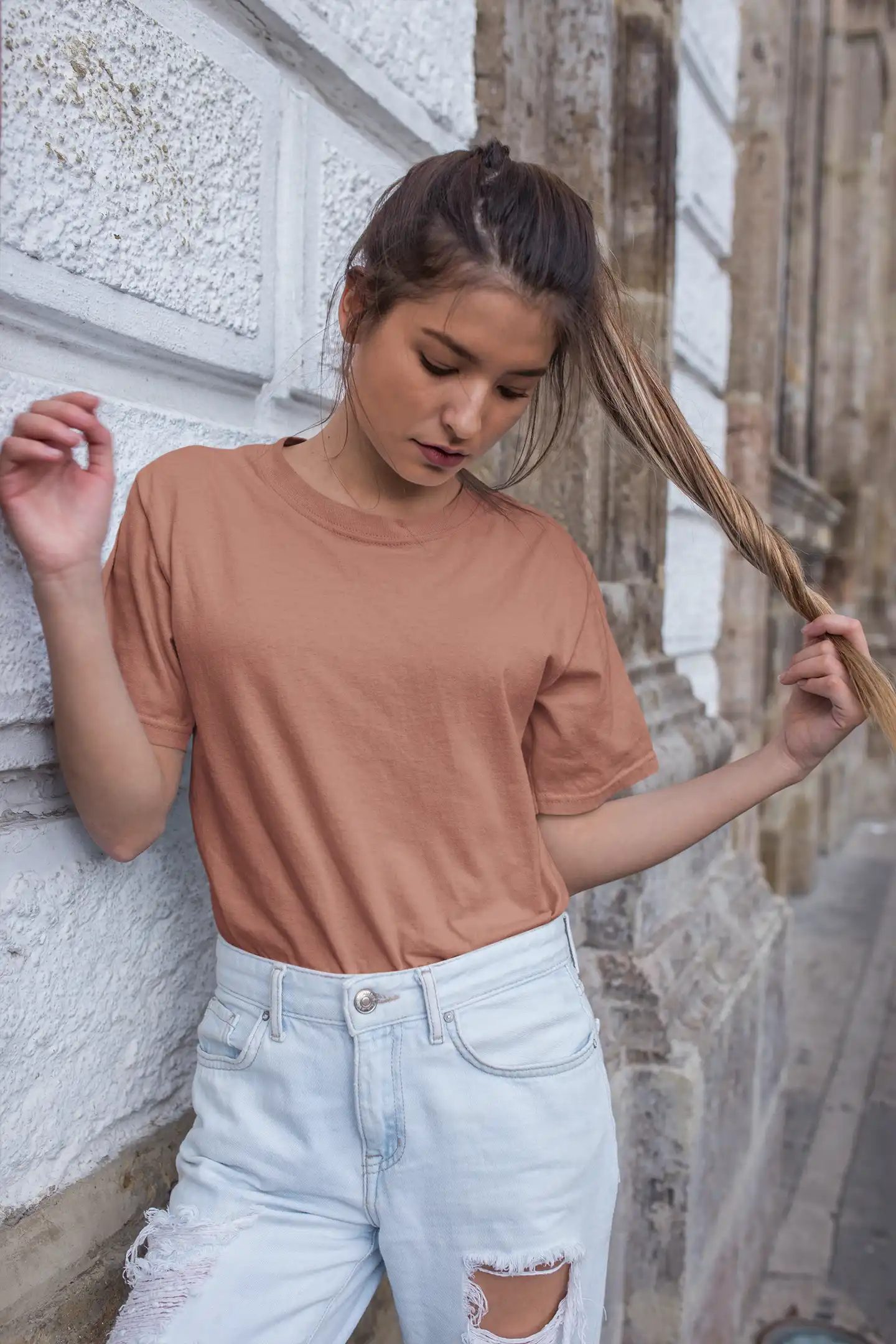 Woman posing in M4S Solids coral Unisex Tee (7) Woman posing in M4S Solids coral Unisex Tee