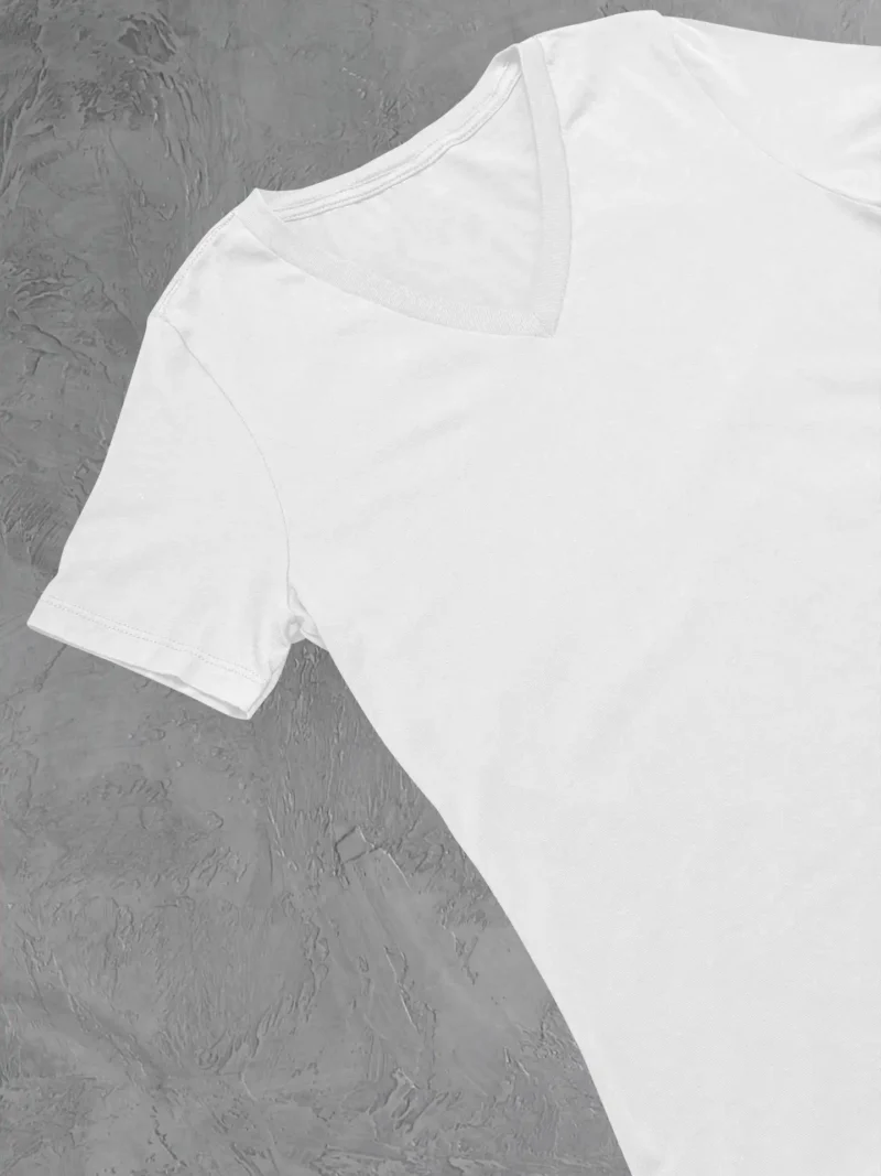 Close up of m4s solids v neck white unisex tee in a studio
