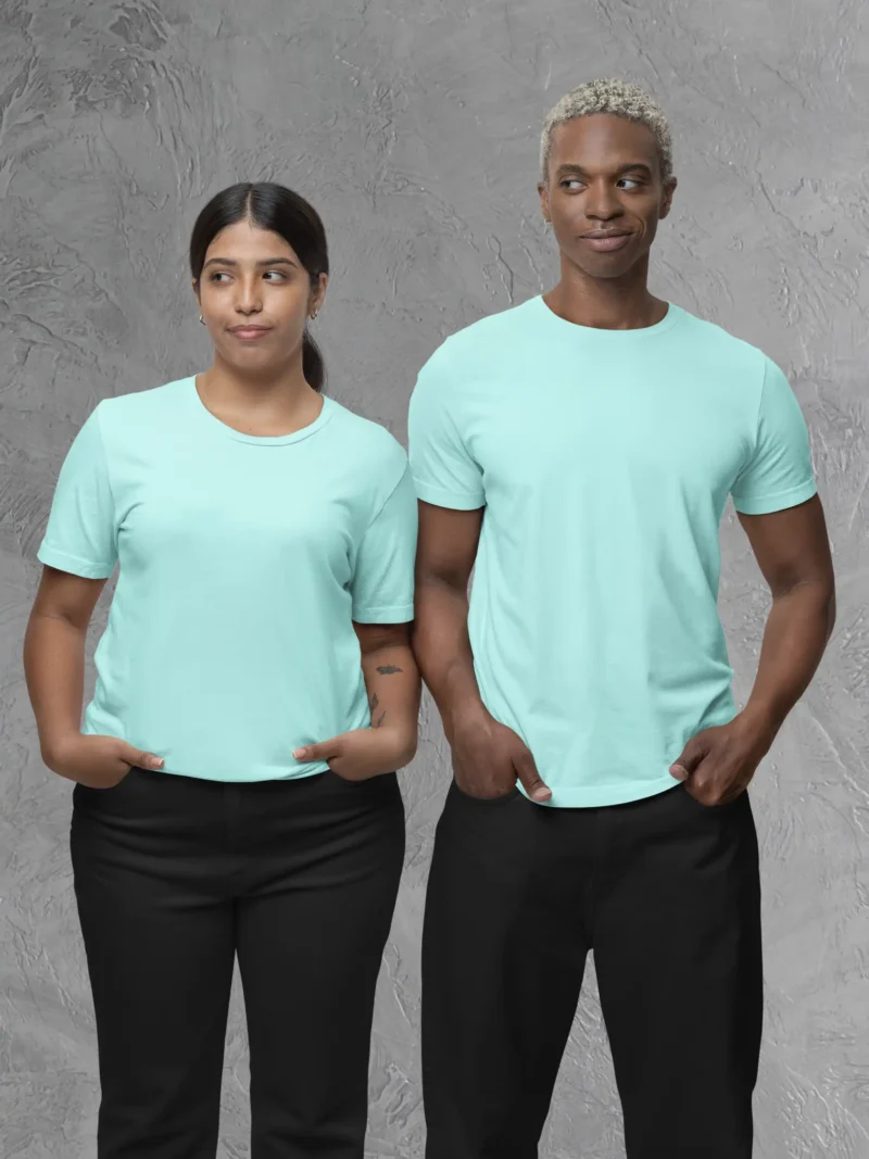 Couple posing in M4S Solids Mint Unisex Tee
