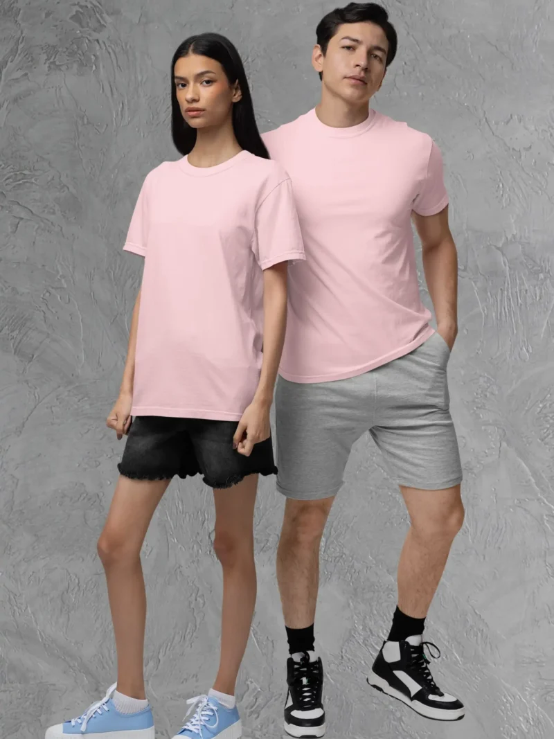 Couple posing in M4S Solids Stretch Light Pink Unisex Tee