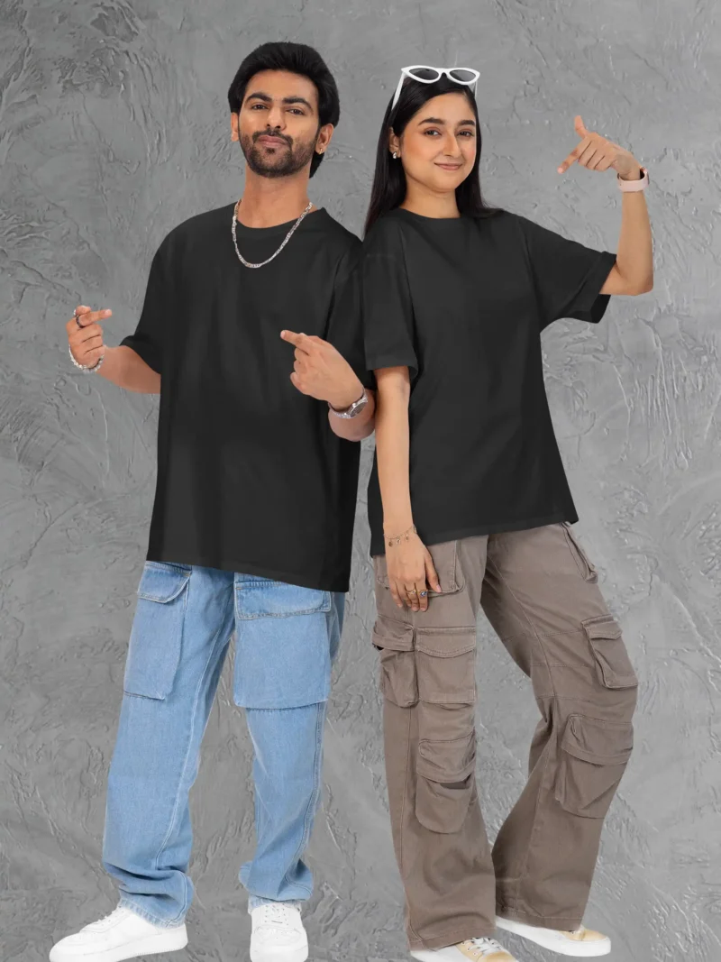 Couple posing in M4S Solids Terry Oversized Black Unisex Tee