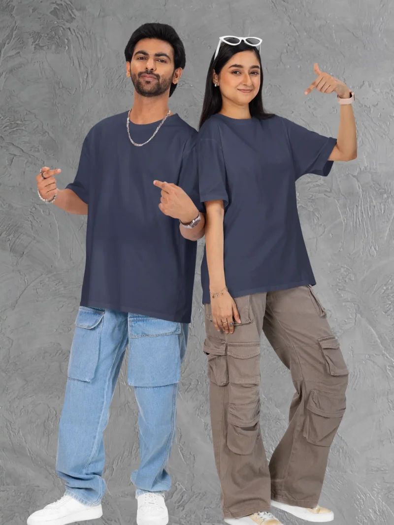 Couple posing in M4S Solids Terry Oversized Navy Blue Unisex Tee
