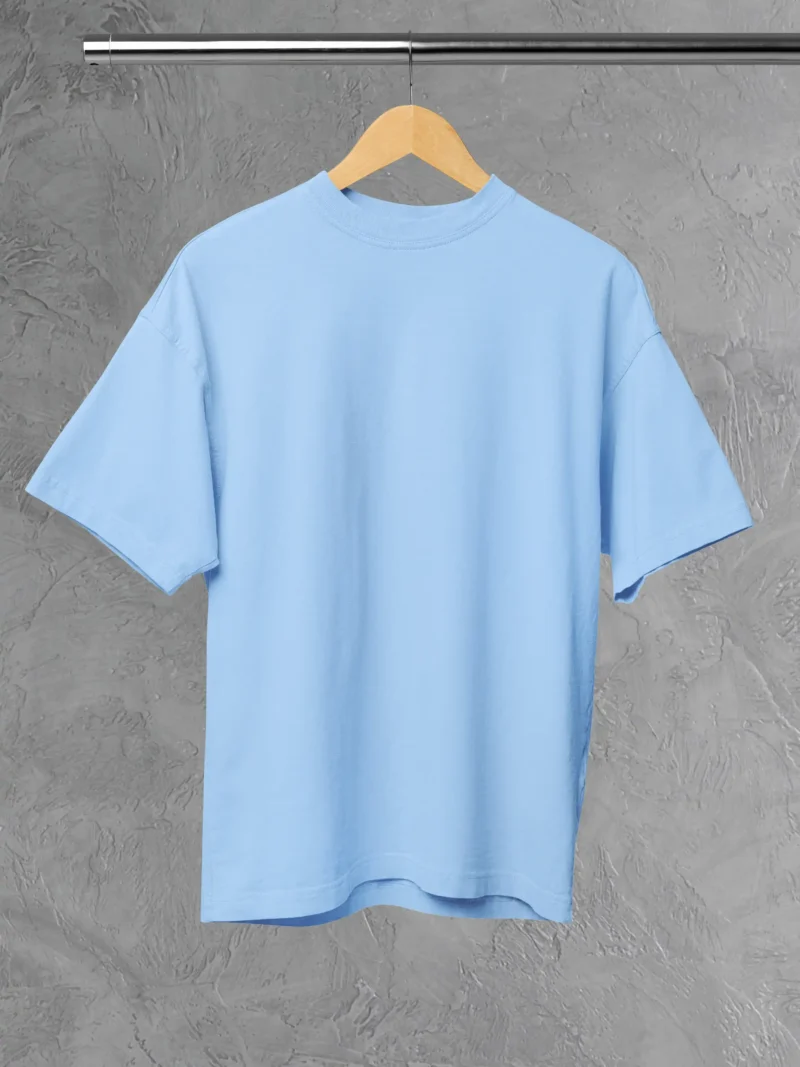 M4S Solids Oversized Baby Blue Unisex Tee Placed on a hanger