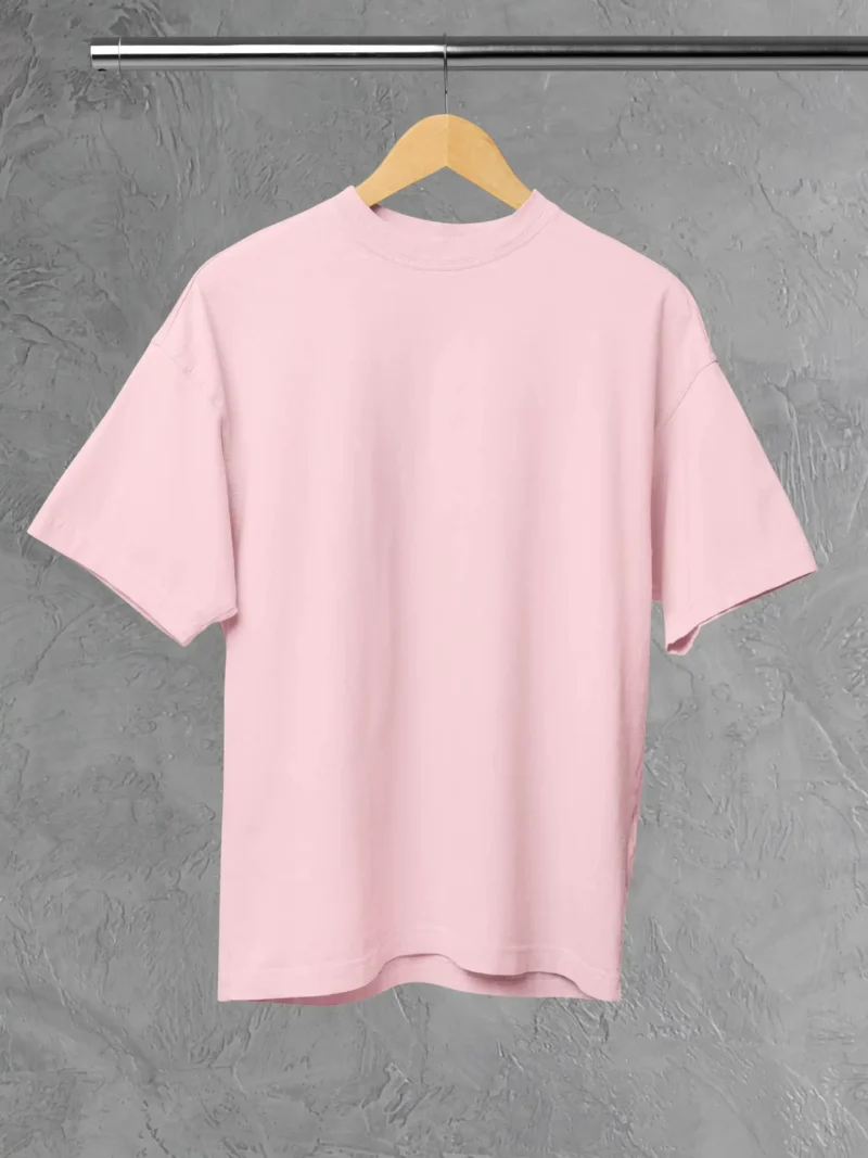 M4S Solids Oversized Light Pink Unisex Tee Placed on a hanger