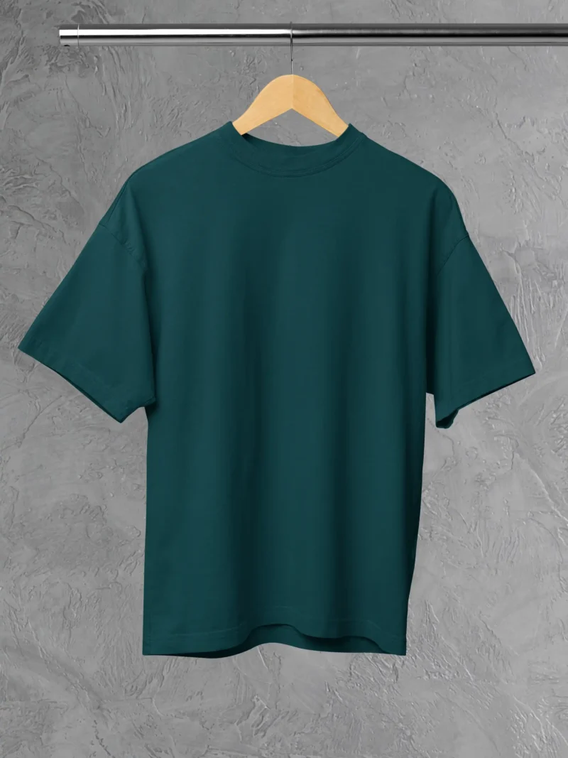 M4S Solids Oversized Petrol Blue Unisex Tee Placed on a hanger