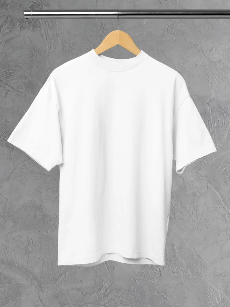 M4S Solids Oversized White Unisex Tee Placed on a hanger