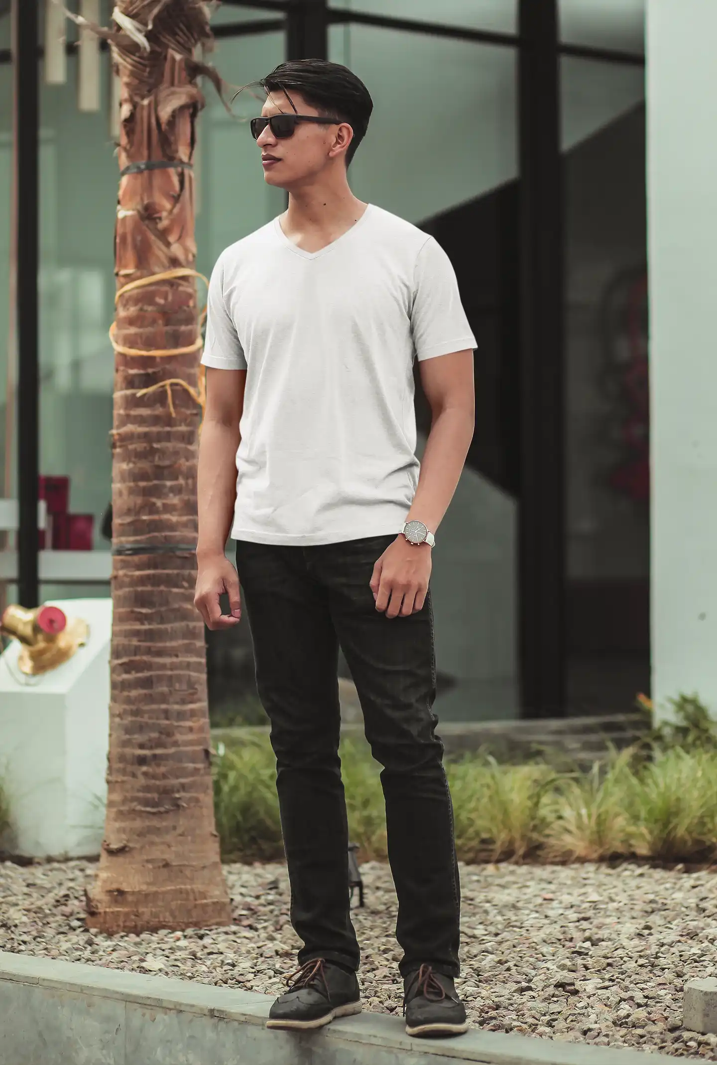 Male model wearing m4s solids v neck white unisex tee (4) Male model wearing m4s solids v neck white unisex tee