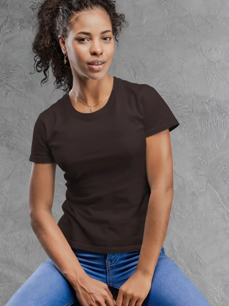 Model wearing M4S Solids Female Classic Coffee Brown Tee against a concrete backdrop