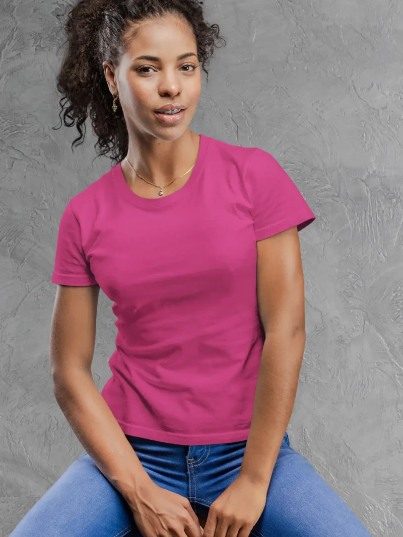 Model wearing M4S Solids Female Classic Pink Tee against a concrete backdrop