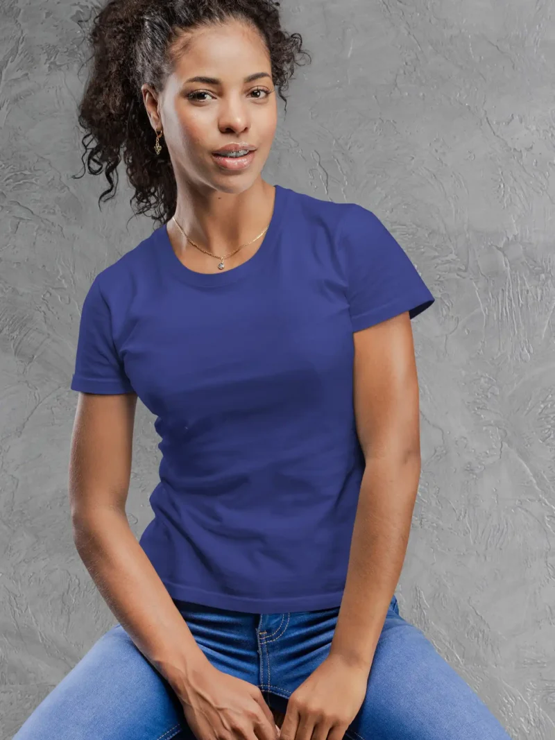 Model wearing M4S Solids Female Classic Royal Blue Tee against a concrete backdrop