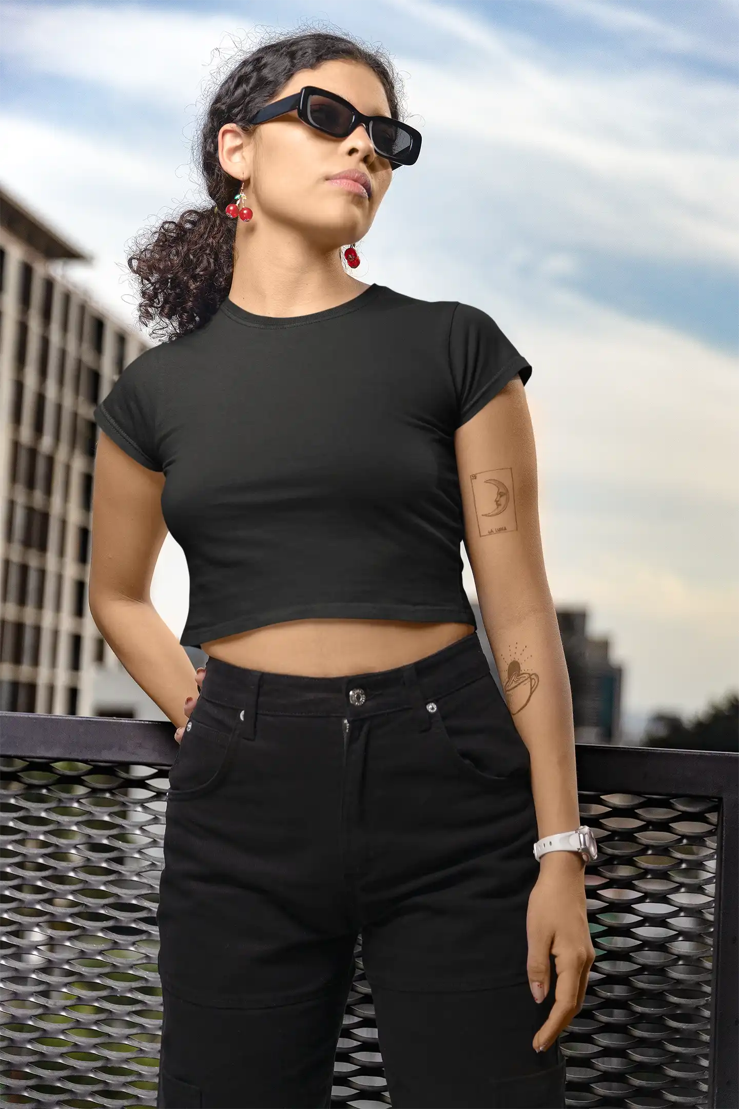 Front view of Woman posing in M4S Solids Black Crop Top 1 Front view of Woman posing in M4S Solids Black Crop Top 1