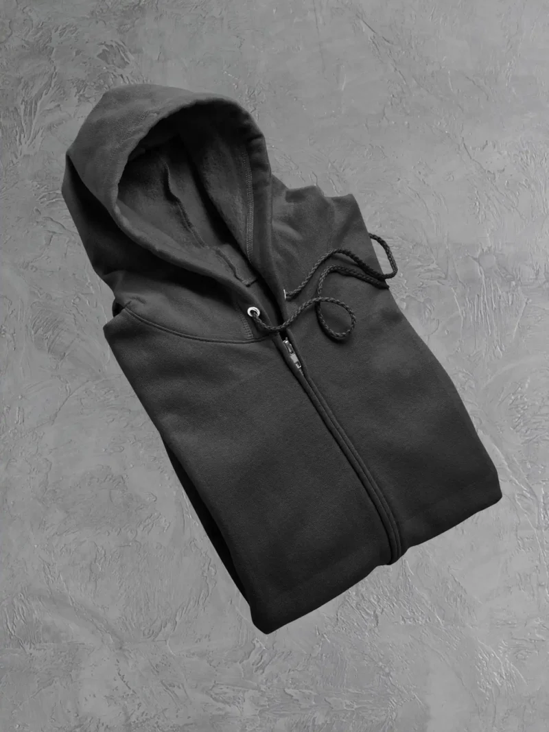 Front Flat Lay of Folded M4S Solids Black Unisex Zip Hoodie