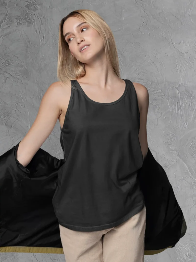 Front view of Woman posing in M4S Solids Black Tank Top 1