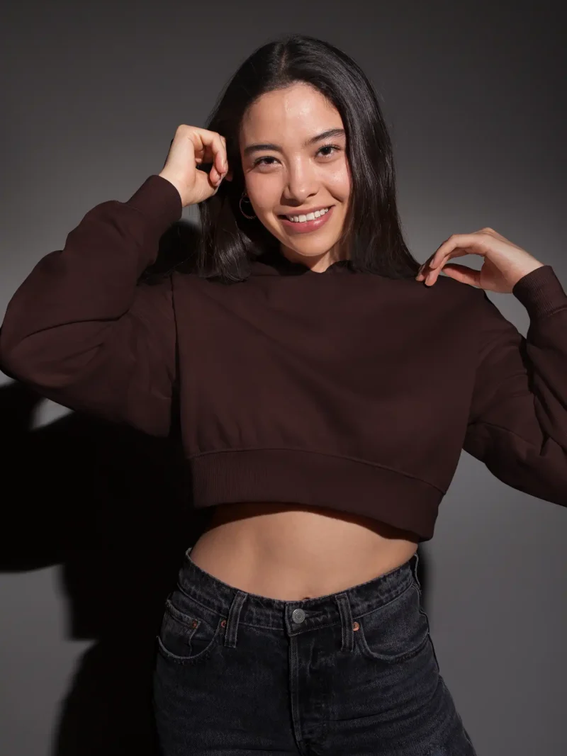 Woman wearing M4S Solids Maroon Cropped Hoodie in a studio 1
