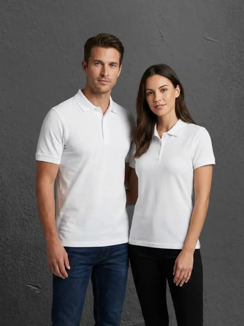 Couple wearing M4S Solids White Unisex Polo in a studio