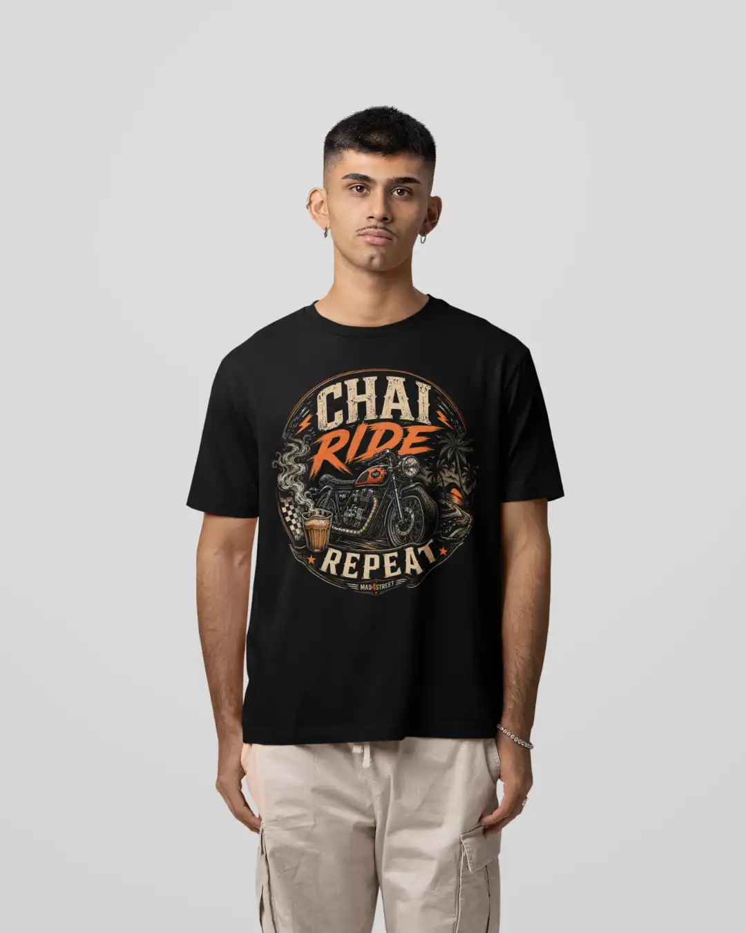 Front view of Man posing in Chai Ride Repeat Black Classic Tee Front view of Man posing in Chai Ride Repeat Black Classic Tee