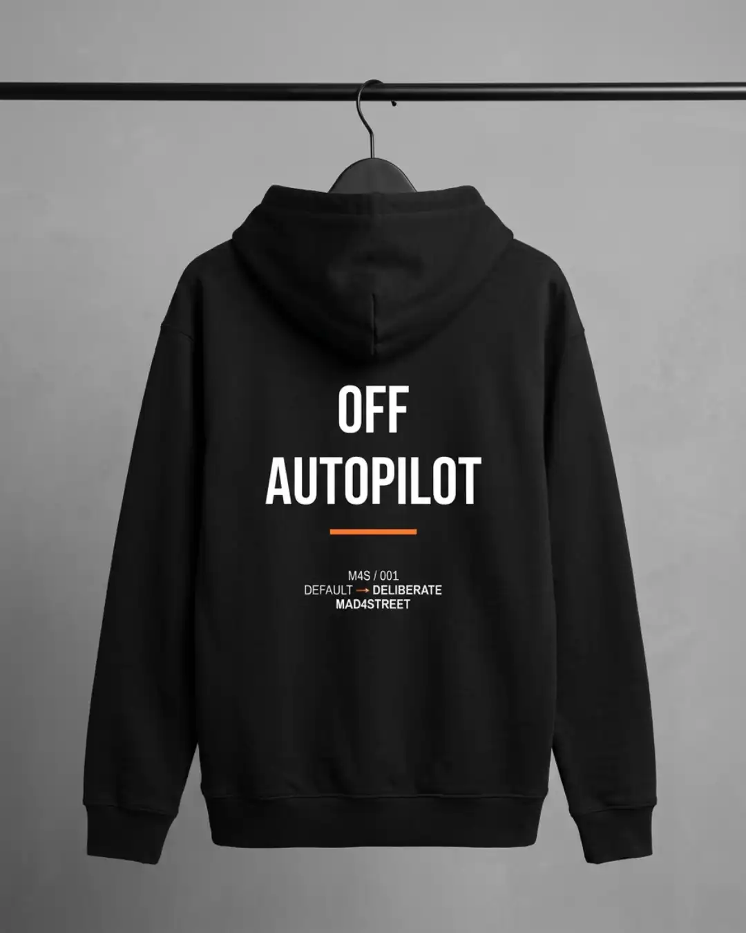 Off Autopilot Hoodie – Back Back view of the black Off Autopilot Hoodie showing the Off Autopilot graphic and orange underline